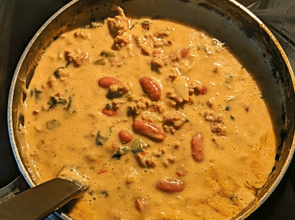 An animated image of hearty beef deep and corn chips.