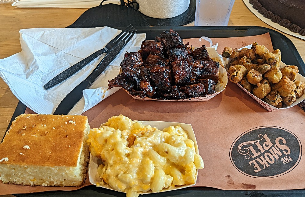 My plate of food. Burned ends, fried okra, macaroni-n-cheese, and cornbread. Photo Credit: Tremaine L. Loadholt